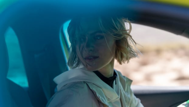 Woman in new peugeot 208